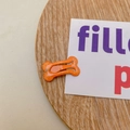 Fermaglio per capelli a forma di osso arancione glitterato per bambini - Arancione