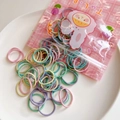 Detail of colorful mini elastic hair bands for babies in a pink cartoon Tulip package - Macaron Color Style (1) / 2.5cm