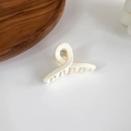 Crossed-knot cream hair claw clip with glossy finish for daily minimalist styling - Crossed Creamy White