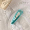 Cyan translucent jelly hair clip with teardrop shape on elegant decorative background - Water Drop Shape / Transparent Sea Blue