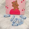 Set of 7 light blue fabric wrapped BB hair clips for girls with textured finish - Blue
