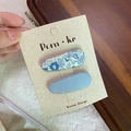 Floral and solid light blue fabric hair clips in Korean style on a brand card - Blue