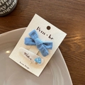 Sky blue bow and beige mushroom embroidery hair clip set on a minimalist ceramic plate - Blue And Mushroom
