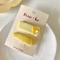 Two-piece yellow waffle knit and checkered fabric hair clip set on a branded card - Rectangular And Drop Shape Set / Yellow