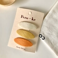 Three-piece set of knitted oval hair clips in cream, ginger yellow, and orange finish - Yellow Series