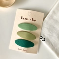 Juego de 3 pinzas para el cabello ovaladas de tela en tonos verdes sobre cartón - Green System