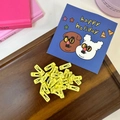 Vibrant yellow mini metal snap hair clips for pets and kids shown in a wooden tray - Light Yellow Square