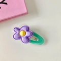 Floral hair clip with purple petals, yellow center, and mint green base for girls - Purple Flower