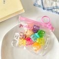 Set di mini mollette per capelli color gelatina in una bustina rosa trasparente - Pinze Zucca Gelatina