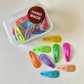 Mini macaron teardrop hair clips set in a clear box with handmade labels - Teardrop