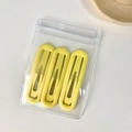 Lot de trois barrettes ovales évidées jaune mat dans un emballage transparent - Jaune Clair Ovale
