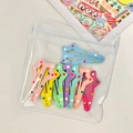 Set of colorful polka dot star-shaped metal hair clips in a clear zipper pouch bag - Large Long Star