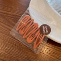 Set of five orange matte teardrop hair clips in a transparent handmade labeled pouch - Pumpkin Orange