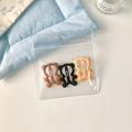 Trois barrettes à cheveux ours en marron foncé, noir et orange avec finition mate - Combinaison Marron Noir Chair