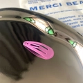 Mini 3cm matte purple drop-shaped BB hair clip for girls on a dark metal tray - Violet