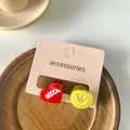 Leuke mini haarklemmen set met rood hart en geel lachebekje op displaykaart - Hart Oog Glimlach