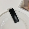 Minimalist black rectangular leather hair clip with elegant lychee texture and fine stitching - Black