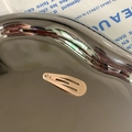 Champagne gold matte water-drop snap clip with hollow design for girls and kids - Nude