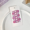 Set of 6 cute pink and blue checkered pattern snap hair clips on a white display card - Pink Blue Houndstooth Style