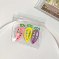 Three carrot-shaped hair clips in pink, yellow, and purple with matte finish for girls - Hollow Carrot Style / Pink And Yellow And Purple