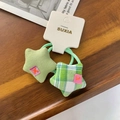 Chouchous en forme d'étoile en velours côtelé vert et tissu à carreaux sur carte - Étoile à Carreaux Vert