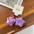 Pair of purple star-shaped hair ties in plaid and solid cotton with SUXIA tags - Purple Plaid Star