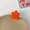 Matte orange star-shaped hair claw clip for girls with a smooth frosted finish - Orange Star