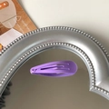Single purple matte finish snap hair clip for girls on vintage mirror background - Light Purple