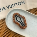 Cute brown and orange knitted marble pattern oval hair clip on a decorative tray - Orange