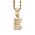 Detailed close-up of golden letter K pendant with ice square cubic zirconia stones - 3mm*60cm / K Gold + Stainless Steel Rope Chain