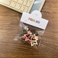 Star and mushroom hair clip set in earthy tones on a retail display card packaging - Mushroom Charm Hair Clip