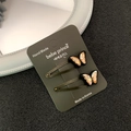 Barrettes à cheveux papillon tendance avec strass ambrés et finition en métal bronze - 2 Pièces/Ensemble / Jaune