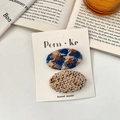 Lot de deux barrettes ovales en tweed aux motifs de tissus tissés bleu et marron - Série Bleue