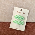 Pair of green and white plaid fabric hair clips with bead accents on a display card - Plaid Oval Drip Set / Green