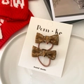 Set of two brown satin bow hair ties with gold leaf patterns on a white card display - Brown