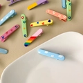 Macaron color duckbill hair clips with cute cartoon prints and matte finish - Blue