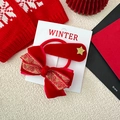 Red velvet bow hair tie and gold star clip set on a decorative festive background - Hairclip & Hair Tie Combo Style