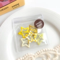 Star-shaped hair clips set with yellow checkerboard and gold sequins in a clear bag - Yellow Series