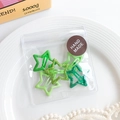 Set de pinzas para el cabello verdes con forma de estrella y lentejuelas jelly - Verde