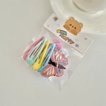 Candy colored hair clips and elastic bands set with butterfly motif in packaging - Butterfly
