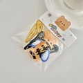 Kids hair accessory set featuring yellow bee clip, black duckbill clip and hair ties - Bee