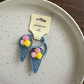 Chouchous faits main motif glace avec pompons roses et jaunes sur élastique bleu - Élastique Glace