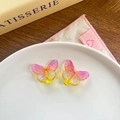 Pink and orange gradient resin butterfly hair clips set on a white ceramic plate - Yellow Series