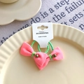 Coppia di elastici per capelli con fiocco in tessuto rosa ed elastici verdi su carta - Fiocco Rosa con Perline