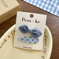 Set of two blue plaid and polka dot bow hair clips on a white display card - Fabric Bow