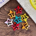 Star-shaped metal snap hair clips with colorful polka dots on a rustic wooden background - Colorful Dot Painted (Style 8)