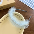 Light blue lace headband with tiered mesh layers and white pearl accents in French style - Lace