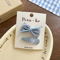 Handmade blue plaid bow hair clip set with lace details on a display card - Plaid Bow Lace
