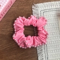Pink scrunchie with faux pearl trim made of elastic fabric for women hair styling - Pink
