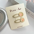Barrettes à fleurs en paillettes roses avec base dorée sur support en carton - Pince Décor Bouton